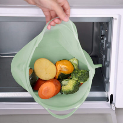 Haakaa Multipurpose Steamer & Steriliser Bag with food