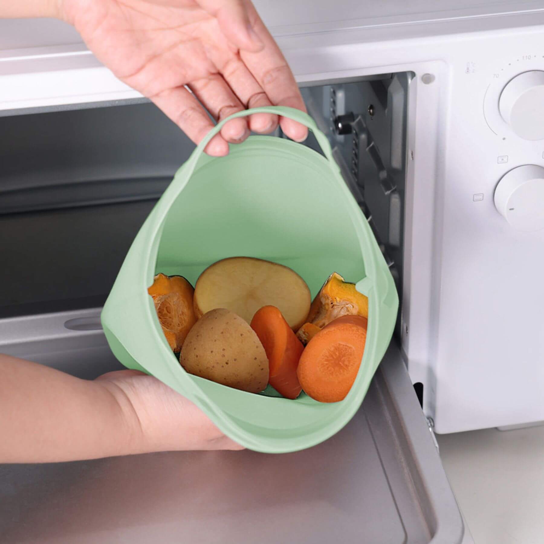Haakaa Multipurpose Steamer & Steriliser Bag with food