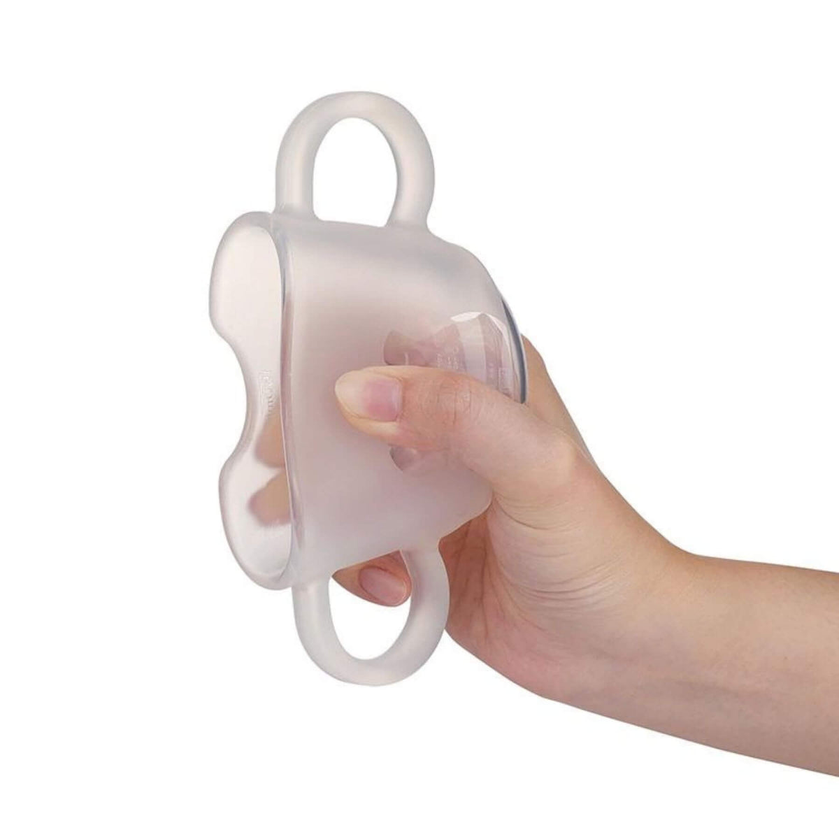Hand holding Haakaa Silicone Baby Drinking Cup