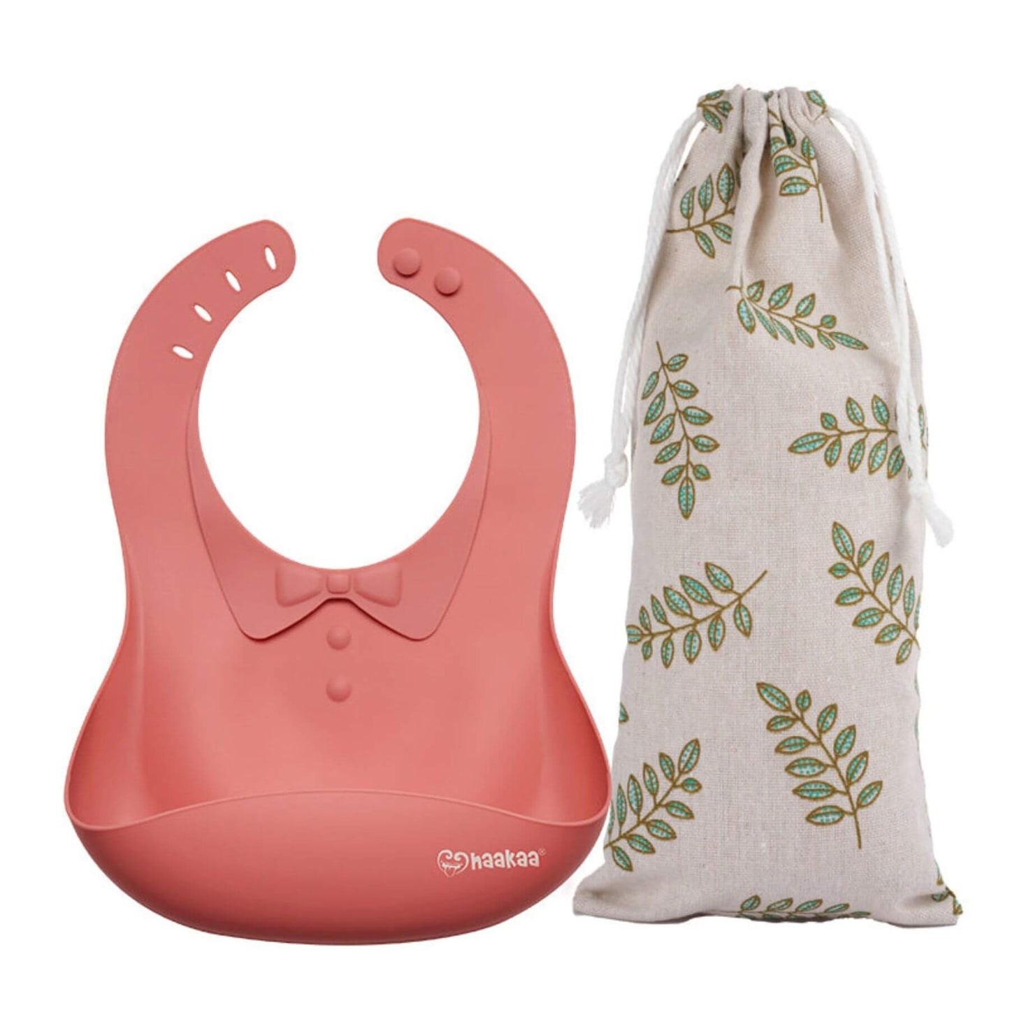 Haakaa Silicone Baby Bib - Ruby and a drawstring bag with leaf pattern on a white background
