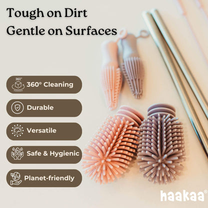 Cleaning brushes with text highlighting features on a light background, featuring the brand 'haakaa'.