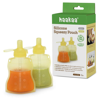 Haakaa silicone squeeze pouches with packaging on a white background