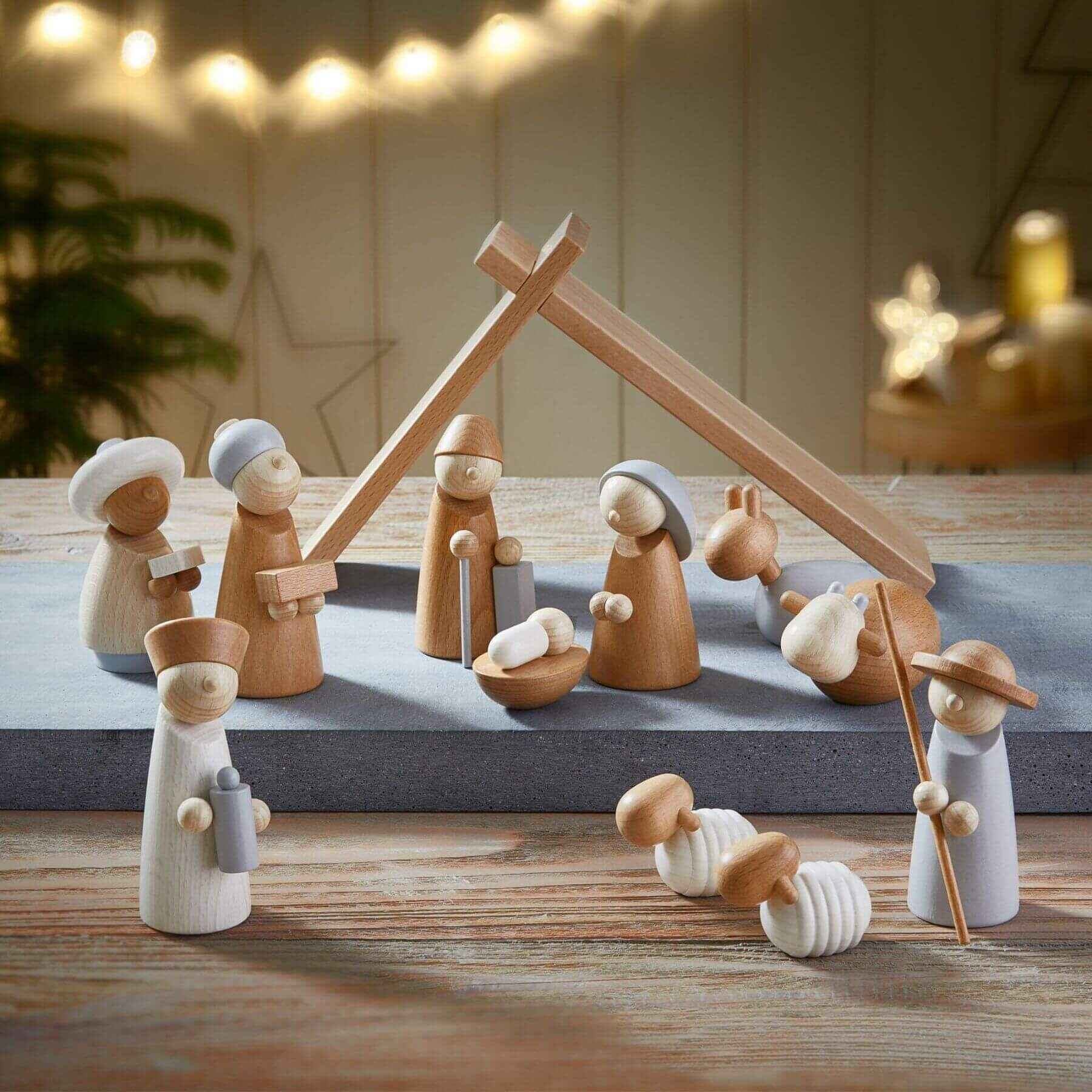HABA USA Natural Wood Nativity Set on a table with a warm, indoor setting.