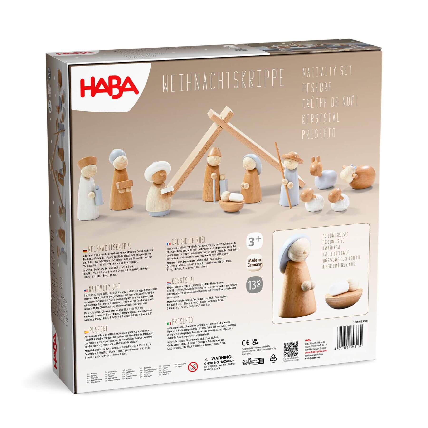 HABA nativity set packaging with wooden figures and stable on a beige background