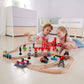 Kids Playing Hape Busy City Rail Set