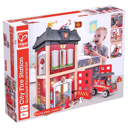 Hape City Fire Station toy set packaging with a child playing with a toy fire truck.