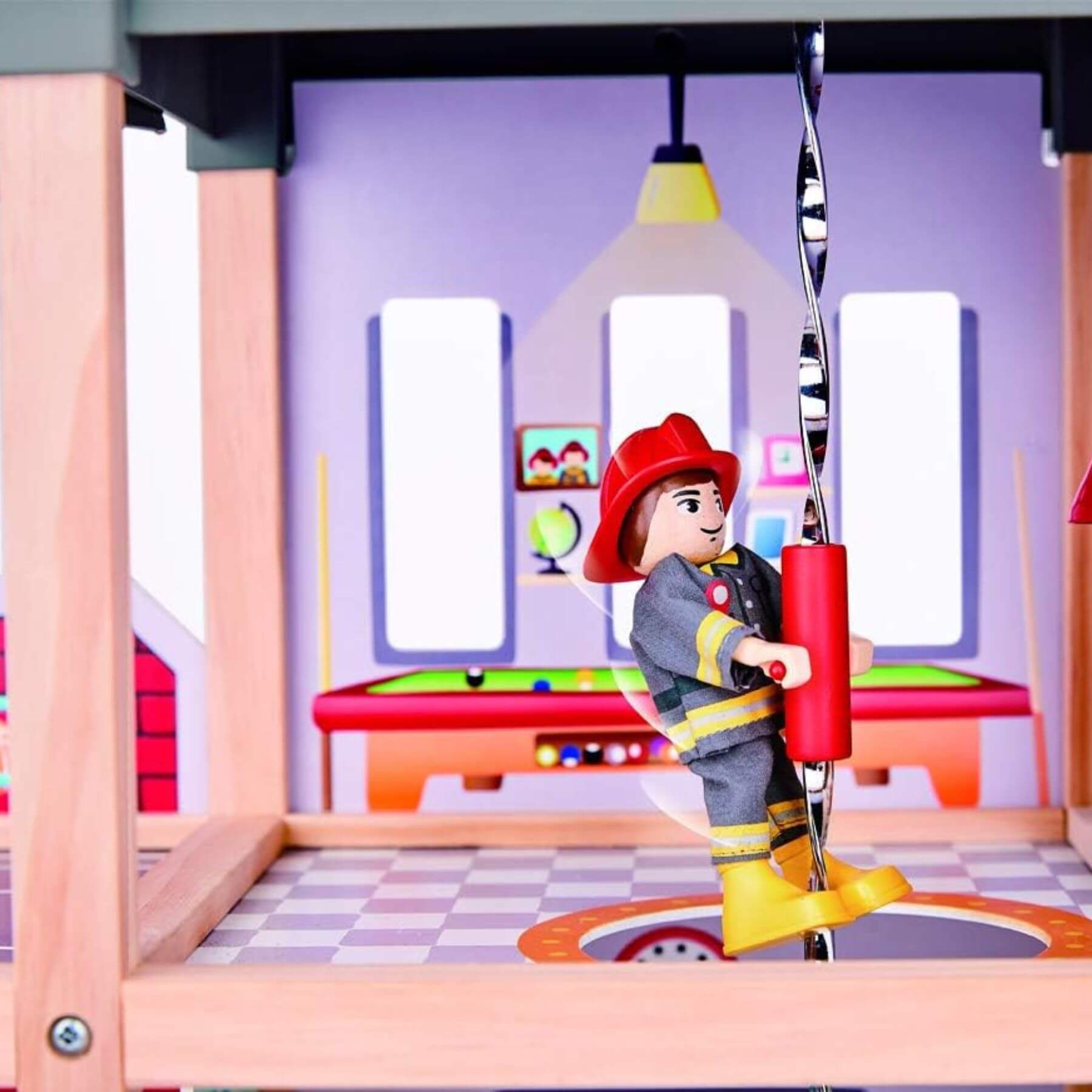 Toy fireman figure in a playset