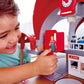 Boy Playing Hape Grand City Station