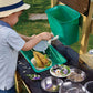 Boy Playing at Hape Outdoor Kitchen