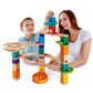 Mom & Boy Playing Hape Quadrilla Cliffhanger Wooden Marble Run Blocks