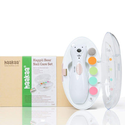 Haakaa Happii Bear Rechargeable Nail Trimmer Set, and its brown and green retail box on a white background.