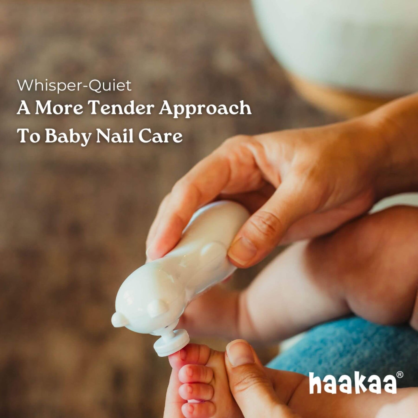 Person holding a baby's foot with a nail trimmer labeled 'naakaa' for baby nail care.