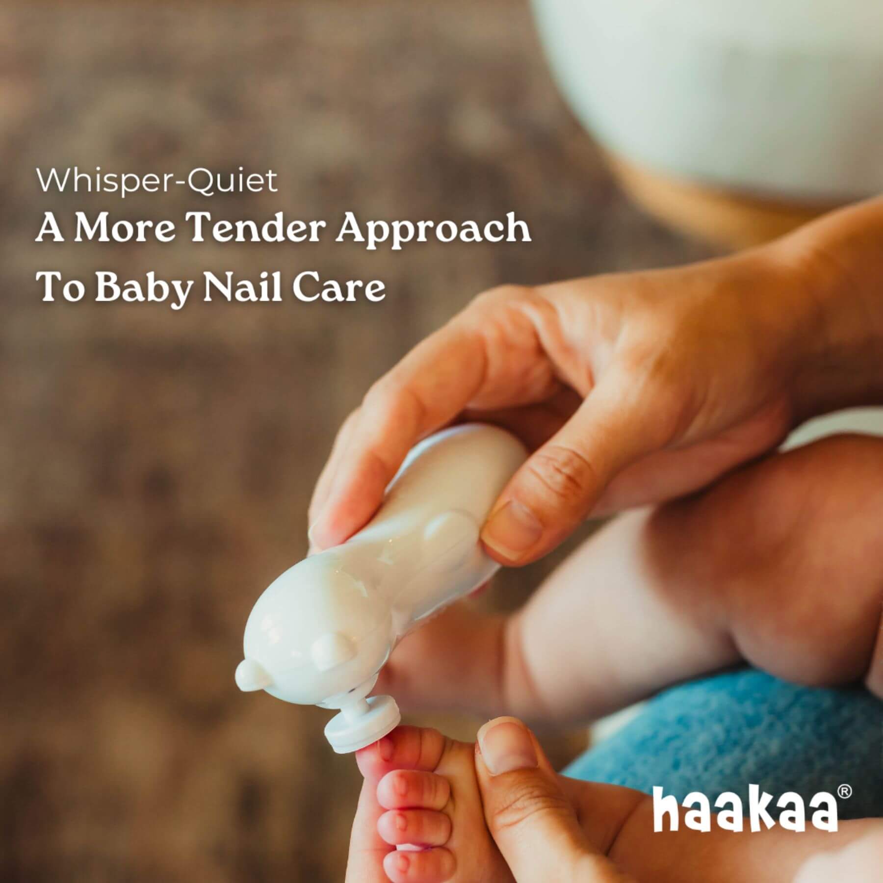 Person holding a baby's foot with a nail trimmer labeled 'naakaa' for baby nail care.