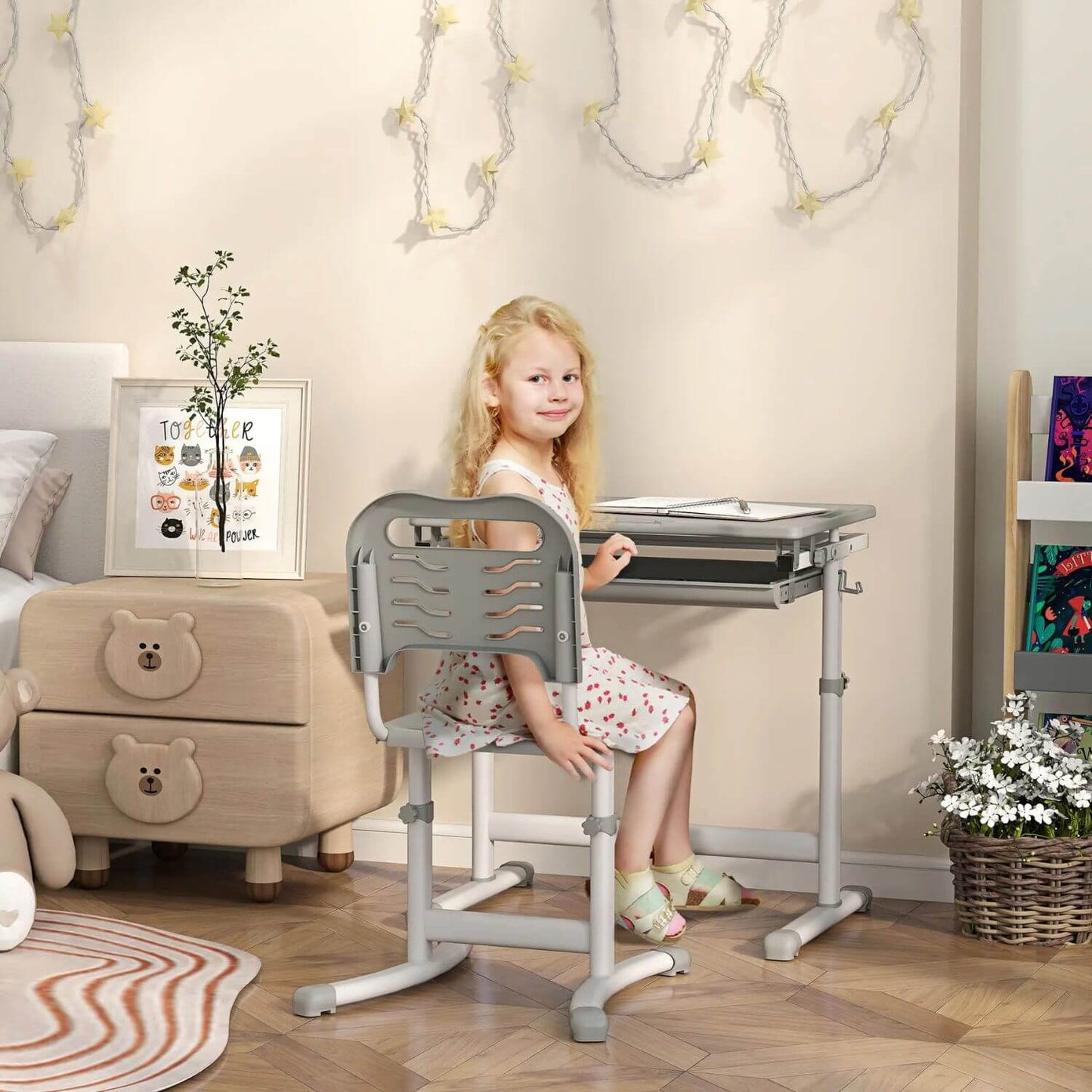 Girl Sitting at Qaba Height Adjustable Kids Desk and Chairs Set Gray