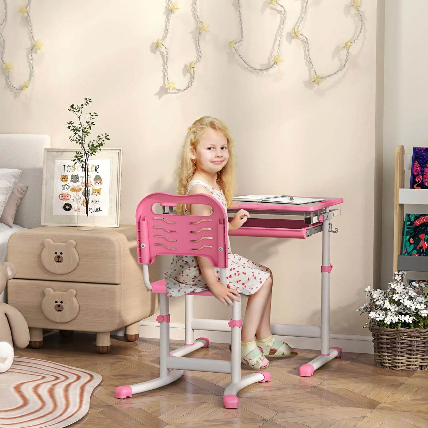 Girl Sitting at Qaba Height Adjustable Kids Desk and Chairs Set