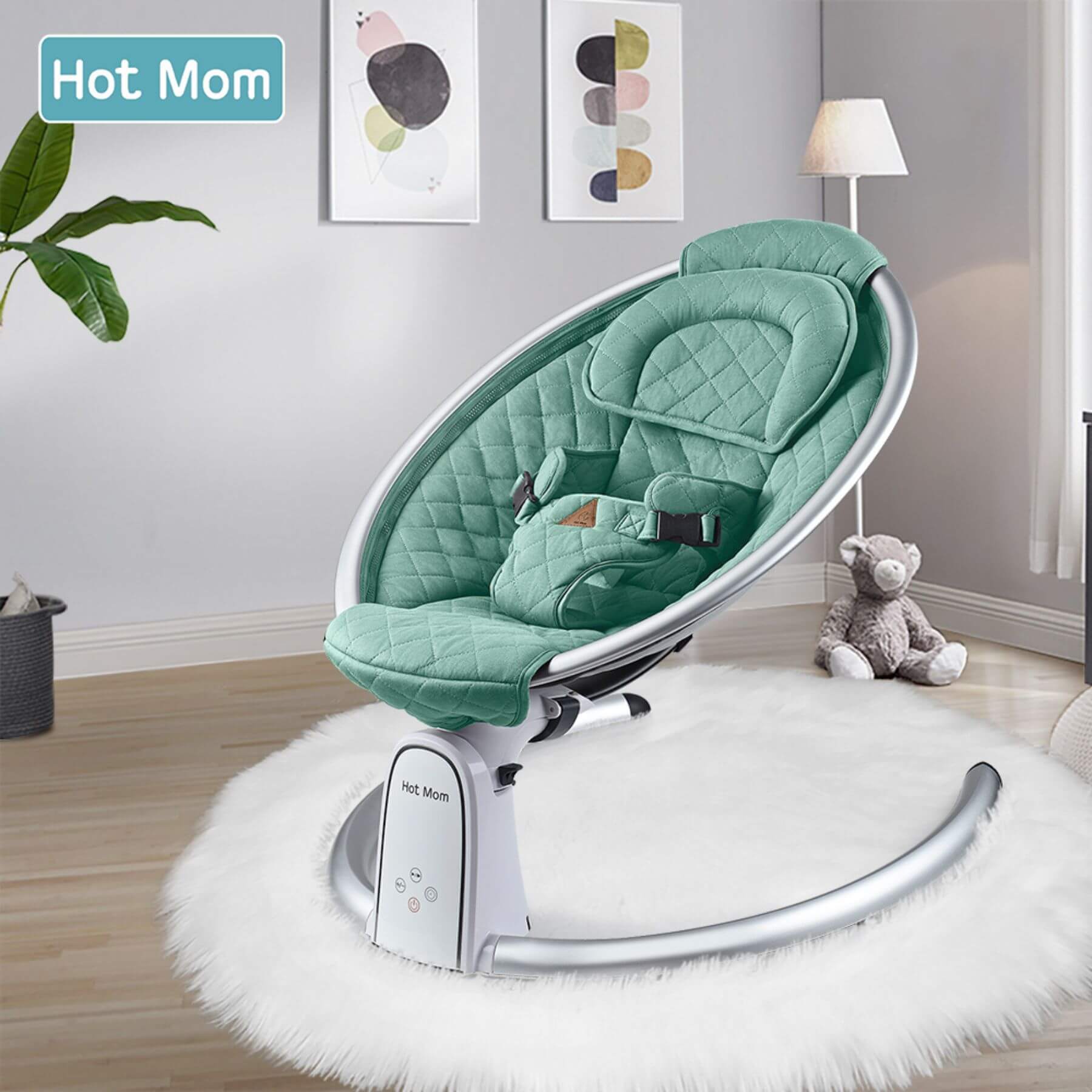 Hot Mom Electric Baby Bouncer for Infant - Green with 'Hot Mom' branding in a room setting.