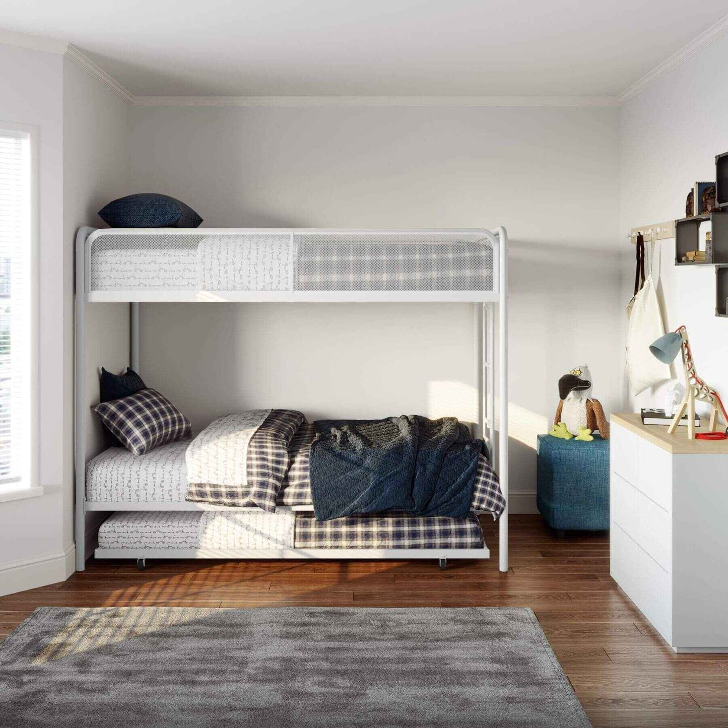 DHP Isaiah Triple Twin Metal Bunk Bed in a room with a desk and window