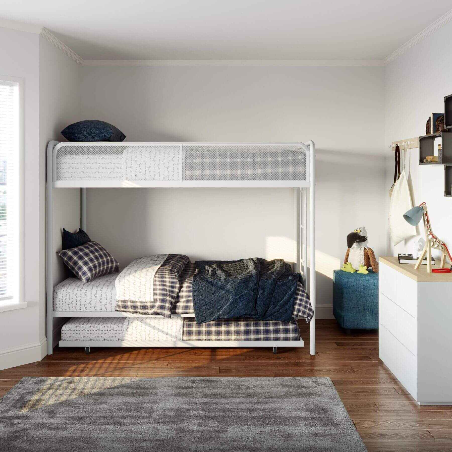 DHP Isaiah Triple Twin Metal Bunk Bed in a room with a desk and window