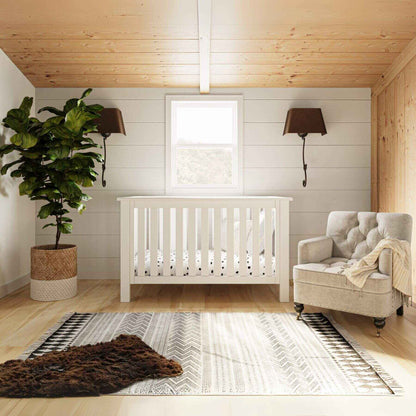 "Just White" Island Convertible Crib in nursery room