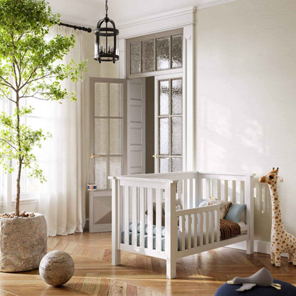 "Just White" Island Convertible Crib in nursery room