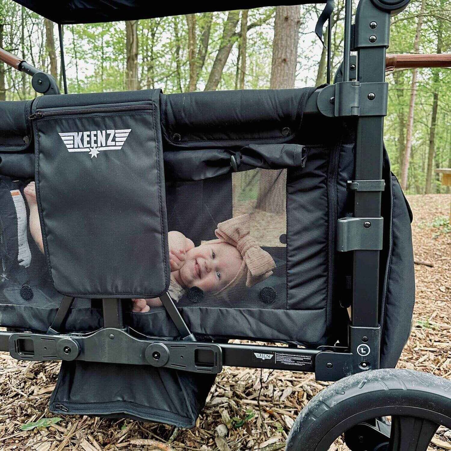 Baby Sleeping in Keenz DUO Stroller Wagon