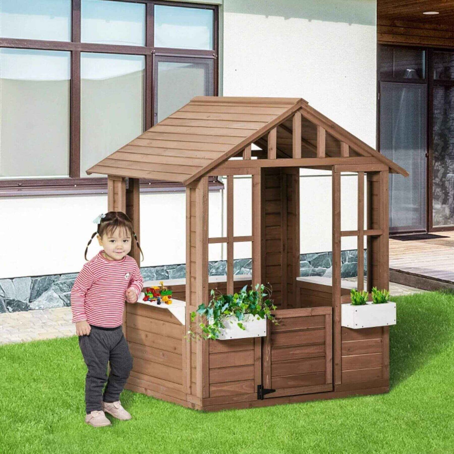 Girl Standing Next to Outsunny Kids Outdoor Wooden Playhouse Brown