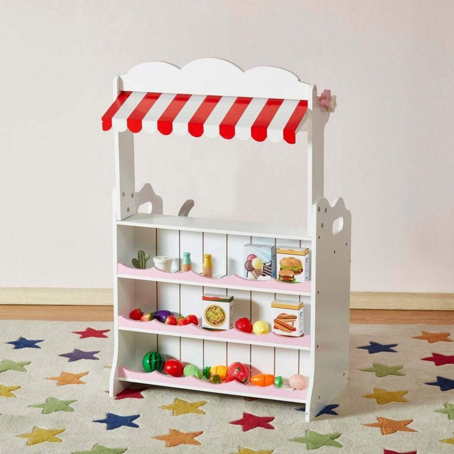 Kids Funnel 2 In 1 Pink Pretend Kitchen and Market Stall with toy food items on a star-patterned rug