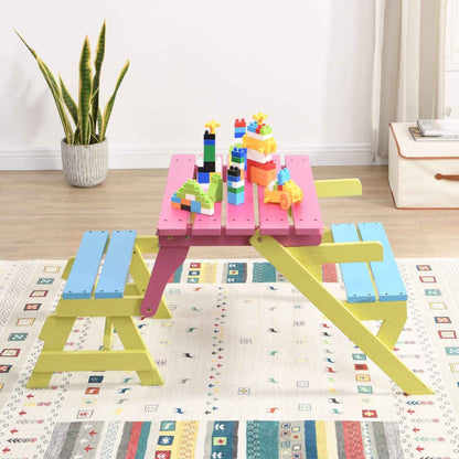 Colorful children's play table with building blocks on a patterned mat