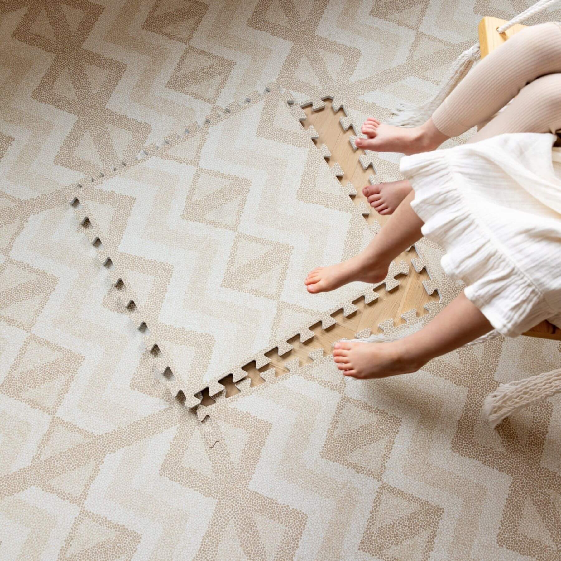 Children's feet on Eeveve Kilim Play Mat - Soft Beige