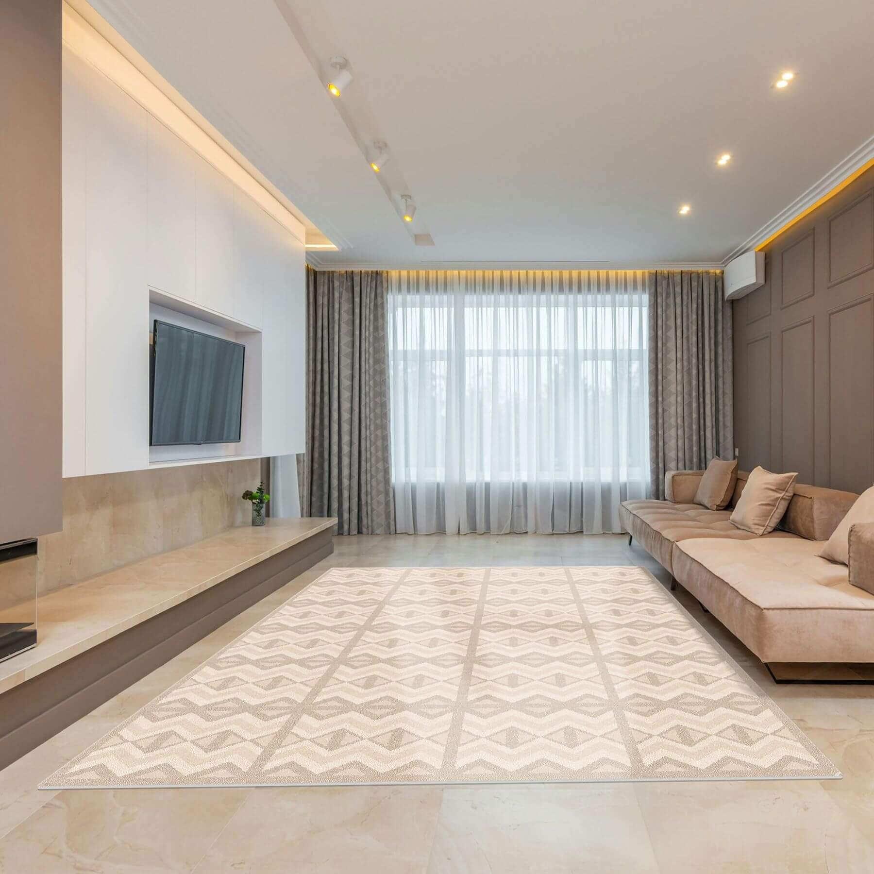 Modern living room with a beige sofa, television, and Eeveve Kilim Play Mat - Soft Beige