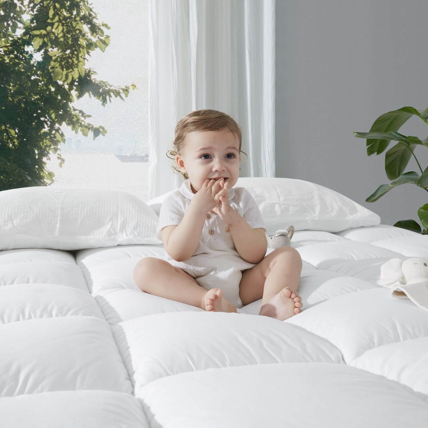 Baby Sitting on KUB Cooling  Mattress Topper White