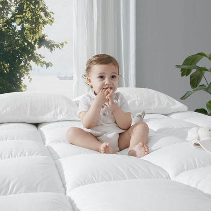 Baby Sitting on KUB Cooling  Mattress Topper White