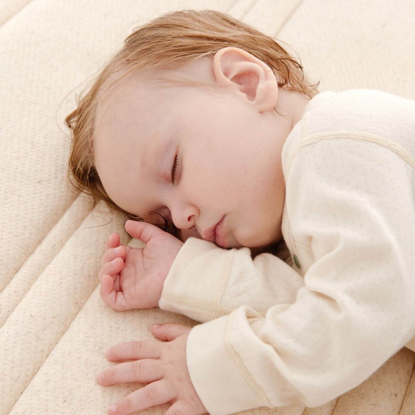 Baby Sleeping on KUB Crib Mattress