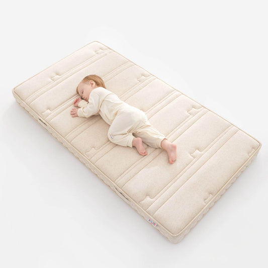 Baby Sleeping on KUB Crib Mattress