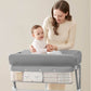 Mom Changing Diaper for Baby on KUB Foldable Changing Table Grey