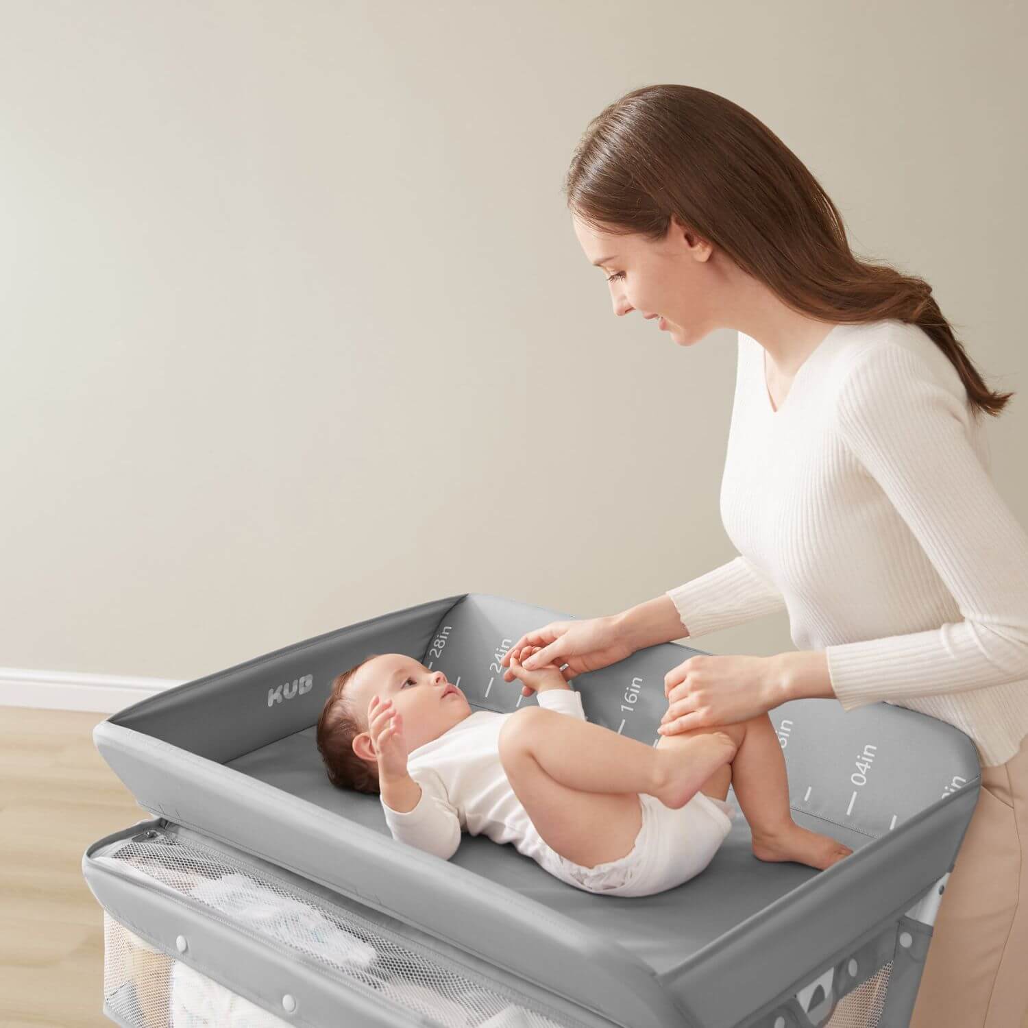 Mom Changing Diaper for Baby on KUB Foldable Changing Table Grey