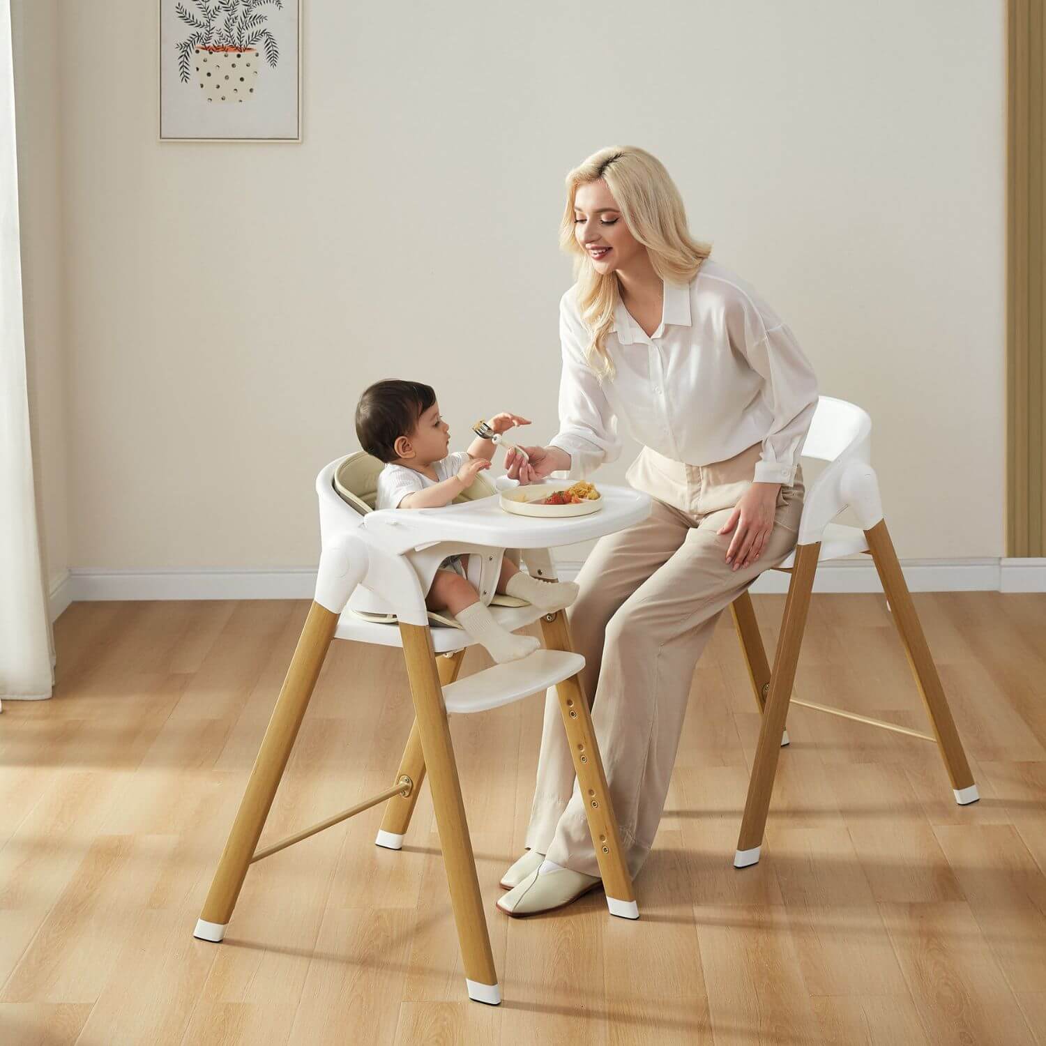 Mom Feeding Baby on KUB High Chair White