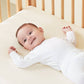 Baby Sleeping on KUB Natural Bliss Crib Sheet