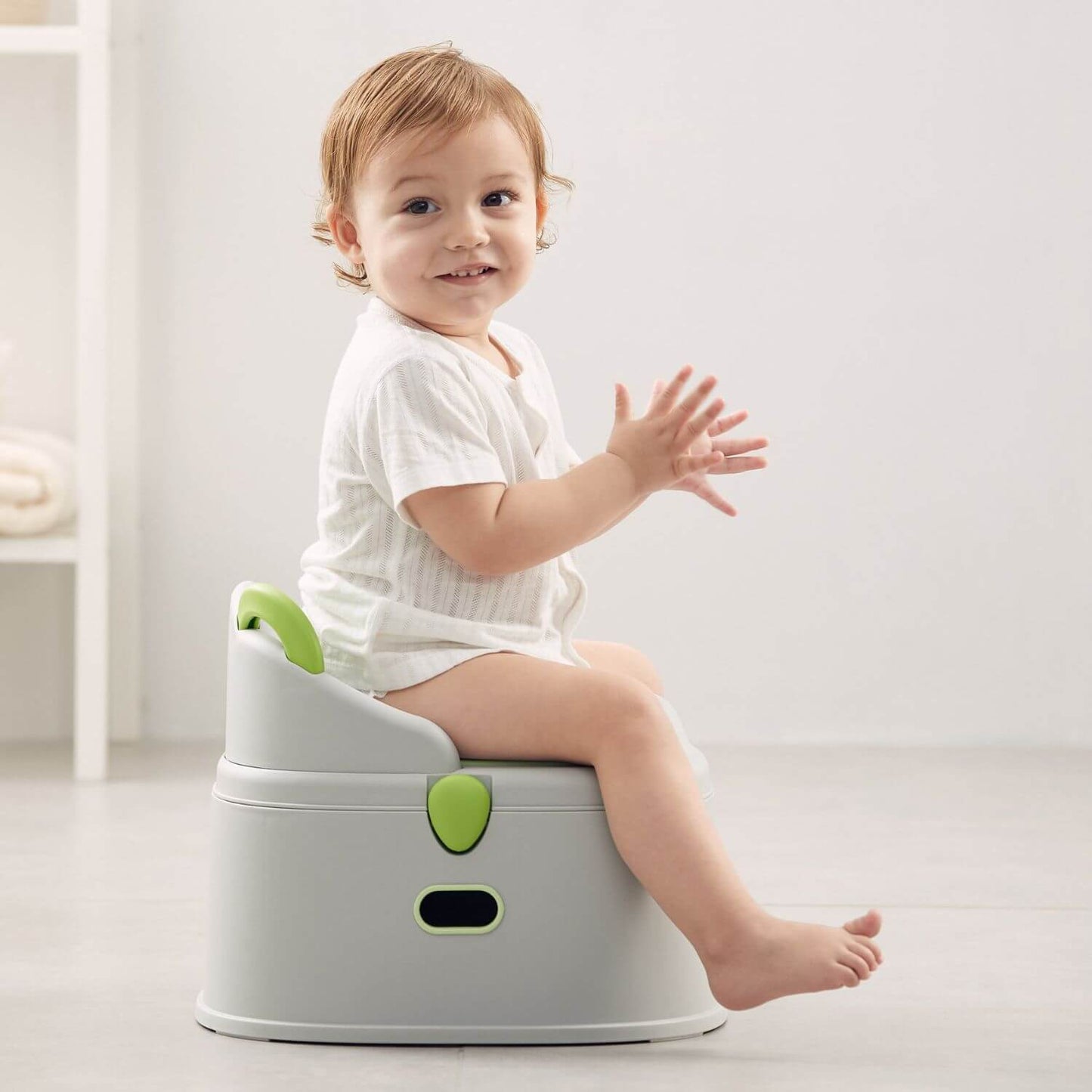 Baby Sitting on KUB Potty Training Toilet Grey