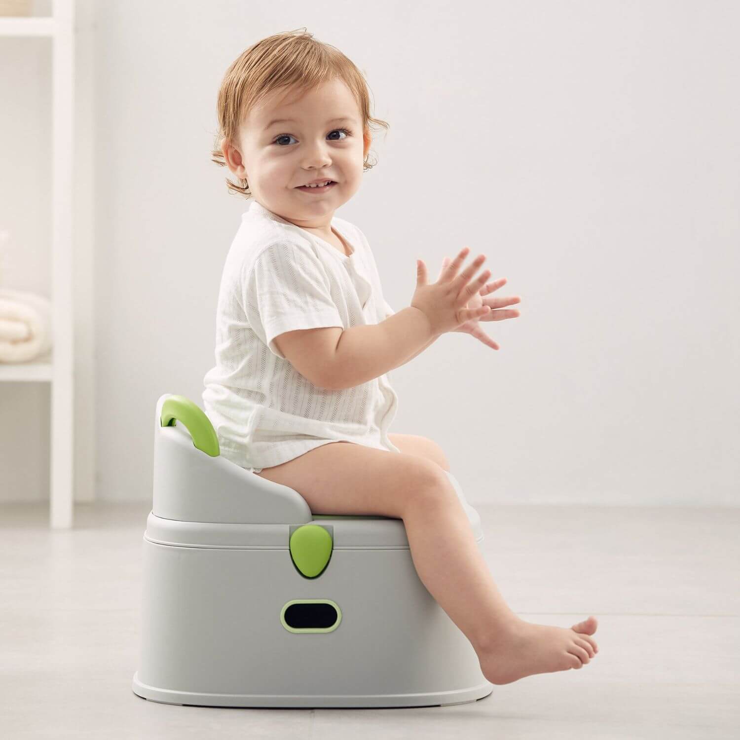 Baby Sitting on KUB Potty Training Toilet Grey