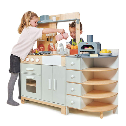Children playing with Tender Leaf La Fiamma Grand Kitchen on a white background