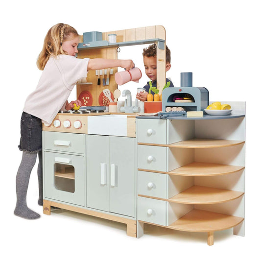 Children playing with Tender Leaf La Fiamma Grand Kitchen on a white background