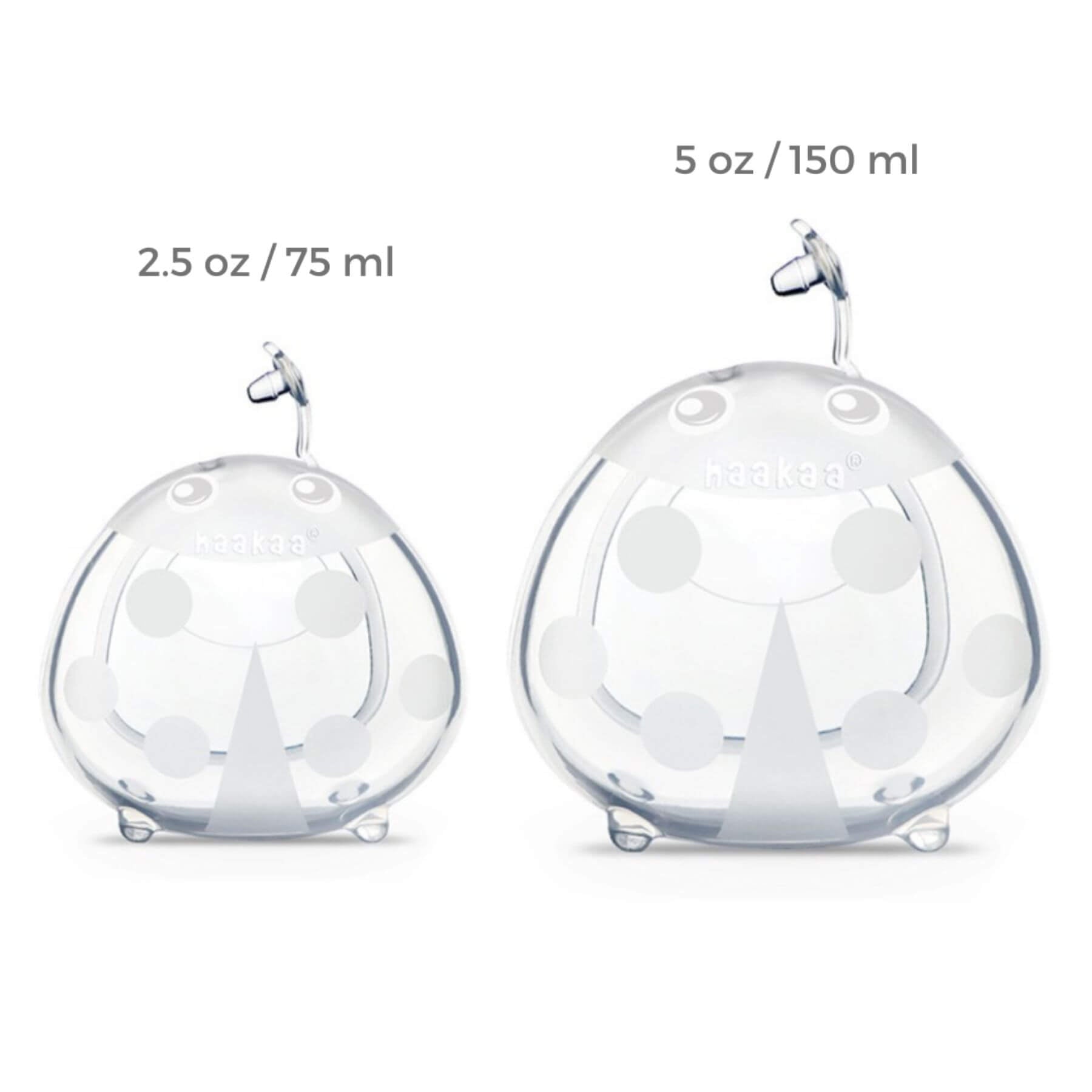 Two Haakaa Ladybug Silicone Milk Collectors with different capacities on a white background
