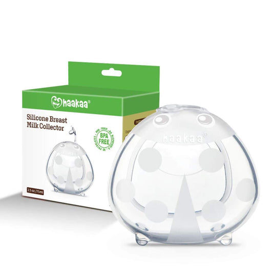 Haakaa Ladybug Silicone Milk Collector with packaging on a white background