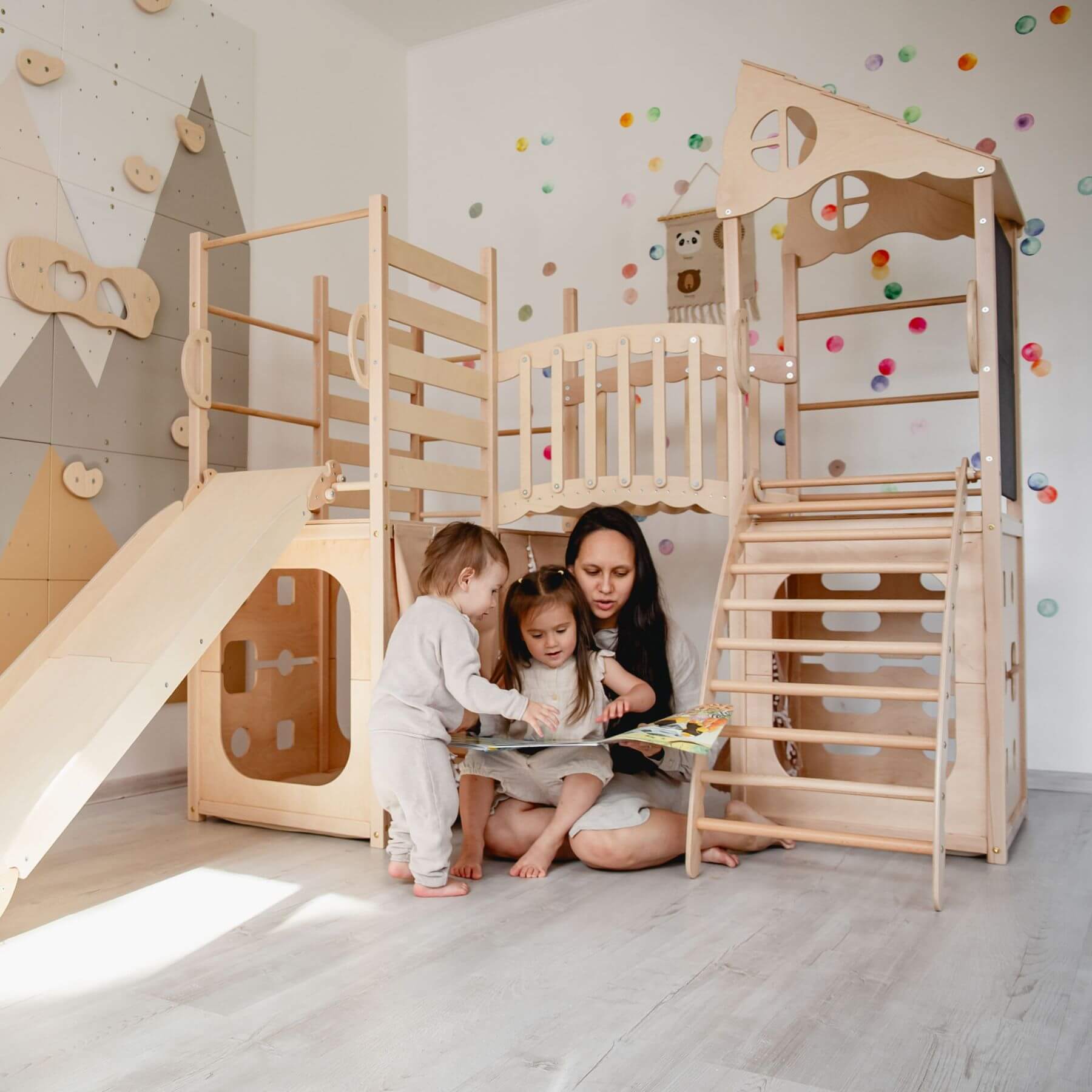 Mom & kids reading under Wood and Hearts Large Playground Climber - Natural