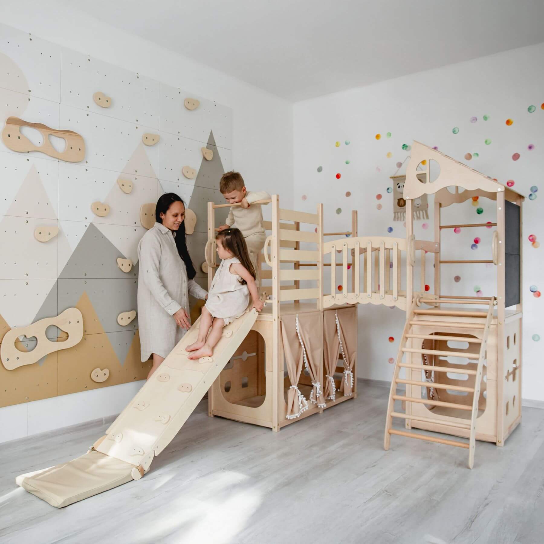 Mom & 2 Kids playing on Wood and Hearts Large Playground Climber - Natural