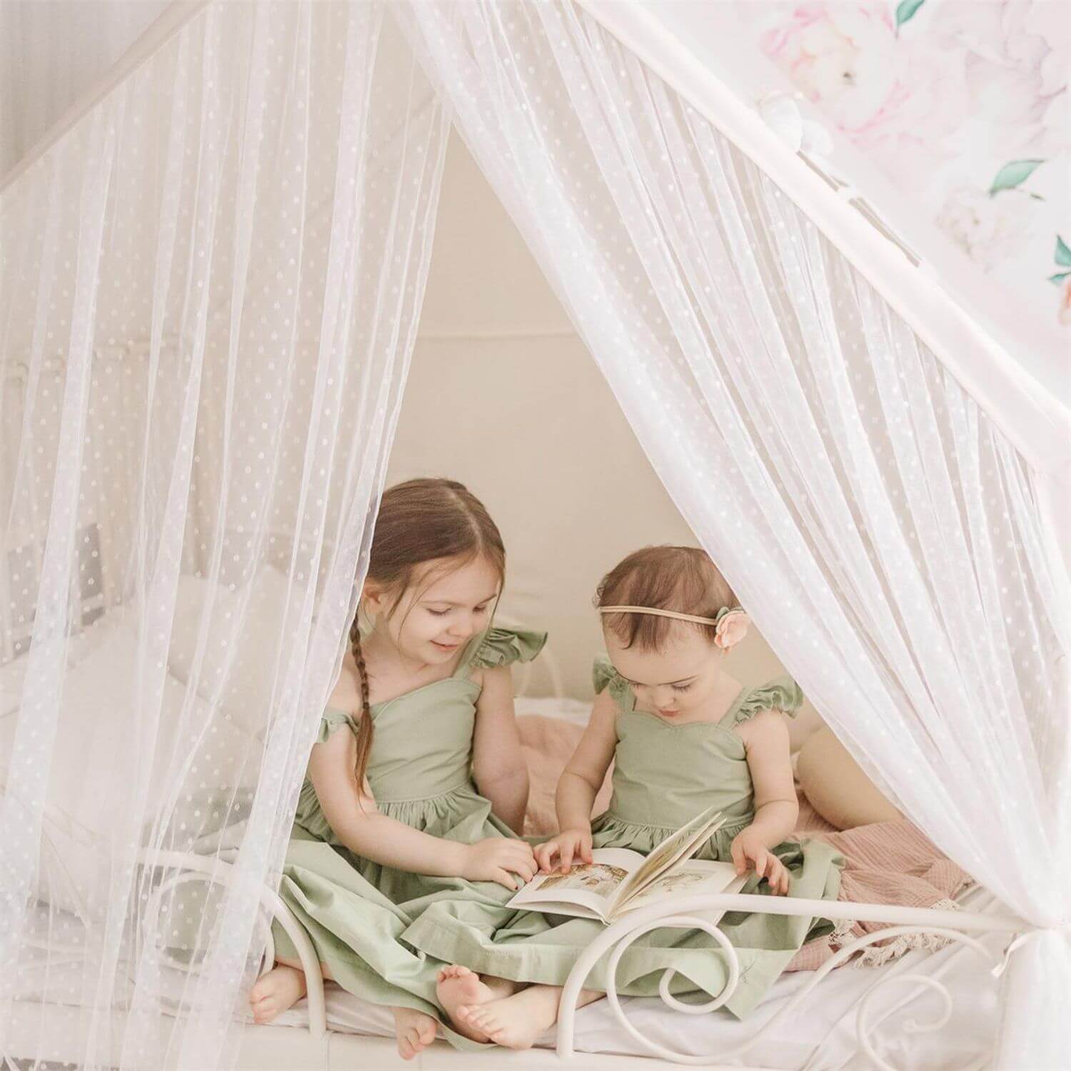 Girls Reading on Bed inside of Tiny Land® Large Space Play House with Star Lights