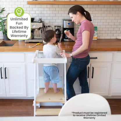 Boy Standing on Little Partners Learn 'N Fold Learning Tower Natural & White, Help Mom with Cook