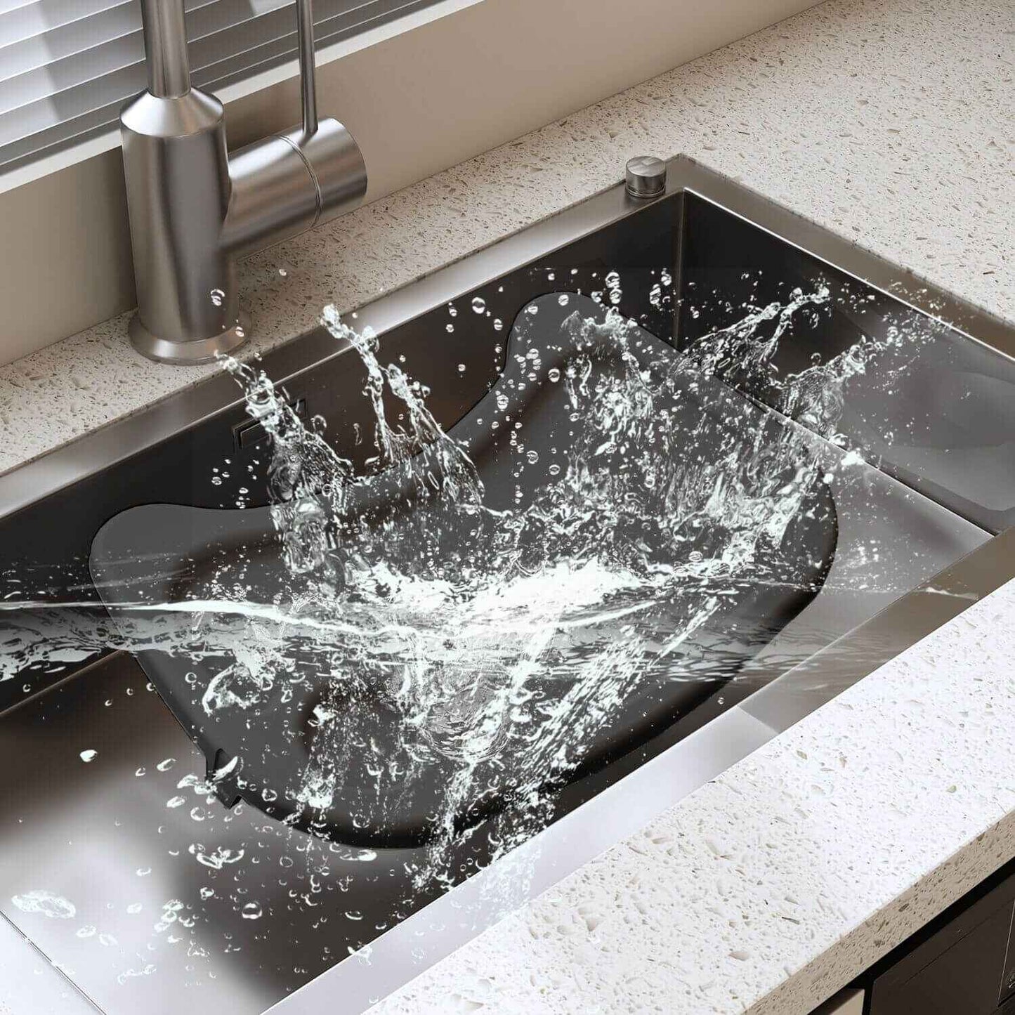 Kitchen sink with water splashing out, showing a close-up of the faucet and sink.