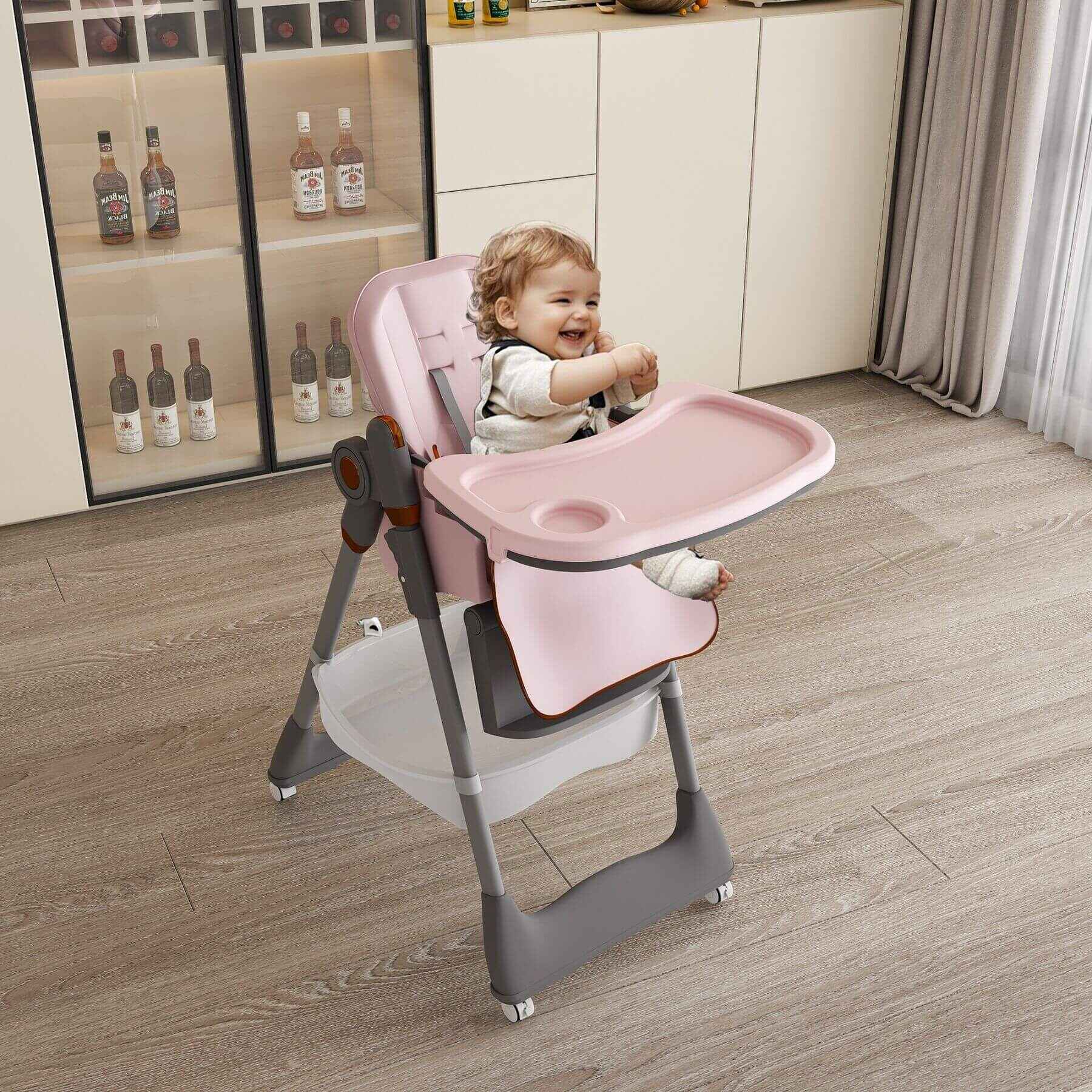 Child in Leavader Adjustable Baby High Chair - Pink in a kitchen setting